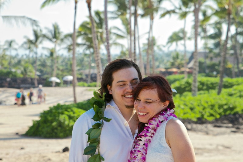Types of Lei: A young couple embrace while wearing newly adorned lei.